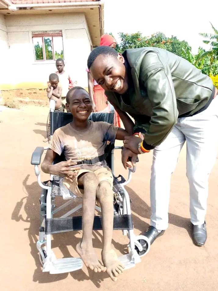 A boy receives a wheelchair